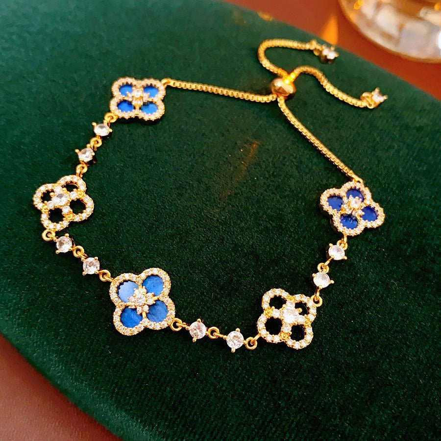 Radiant Blossom Clover BraceletBraceletJewelryBlossomuniqueflowerearringsgiftforhermothergiftdaughtergiftbirthdaygiftanniversarygift