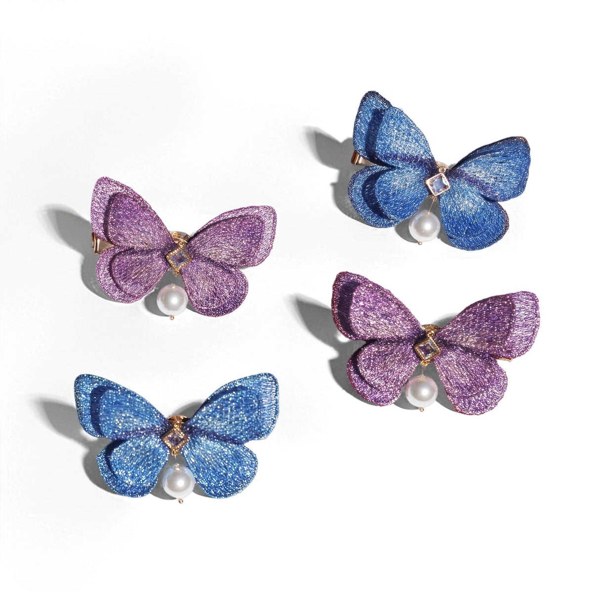 Wisteria Sapphire Butterfly Pearl Drop Hair Clips (4-Piece) Hair Clips JewelryBlossom #flowerjewelry# #weddingjewelry# #bridaljewelry# #weddinggift# #bridemaidgift##giftforher# #mothergift# #daughtergift# #birthdaygift# #anniversarygi