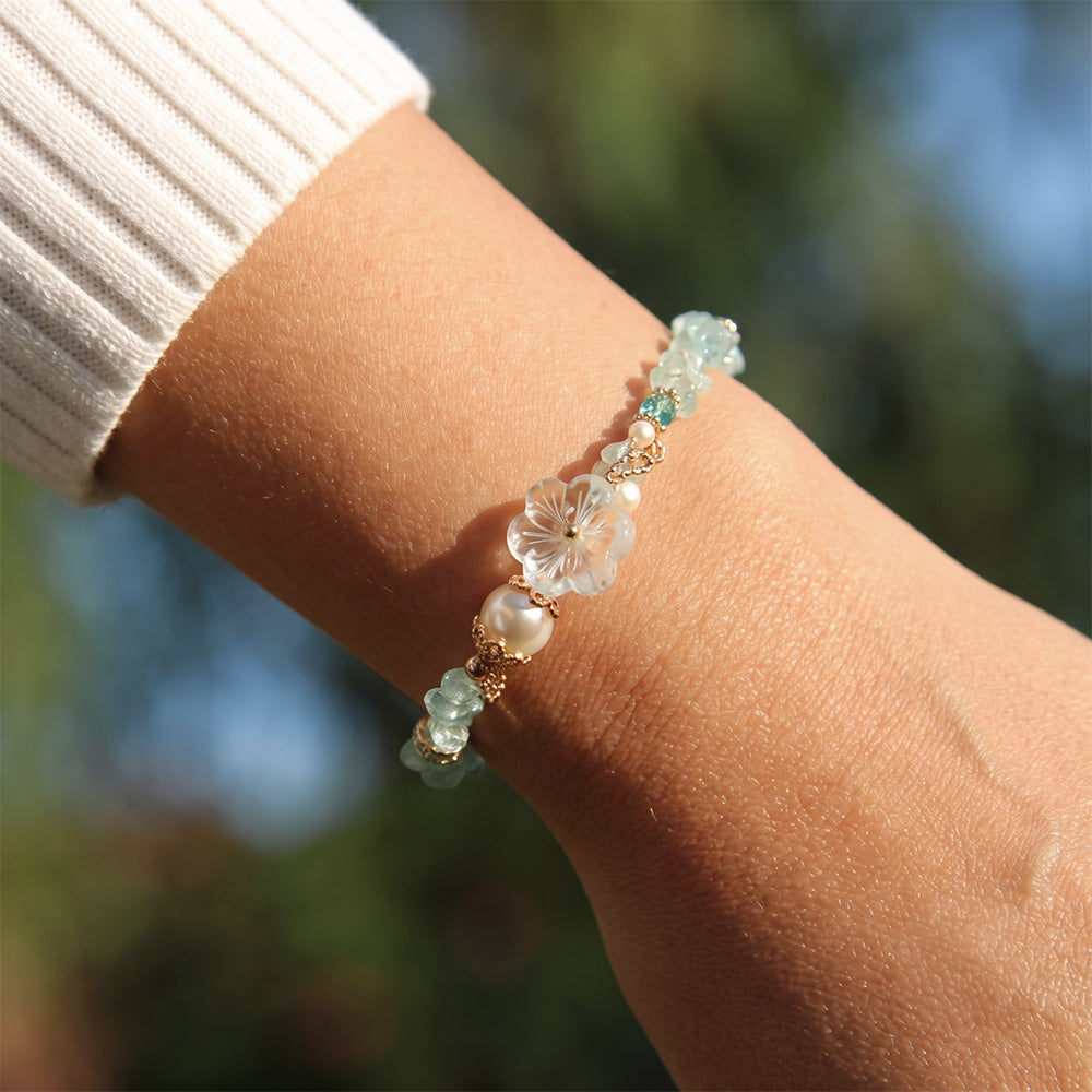 Aquamarine White Flower Charm Golden Chain Bracelet