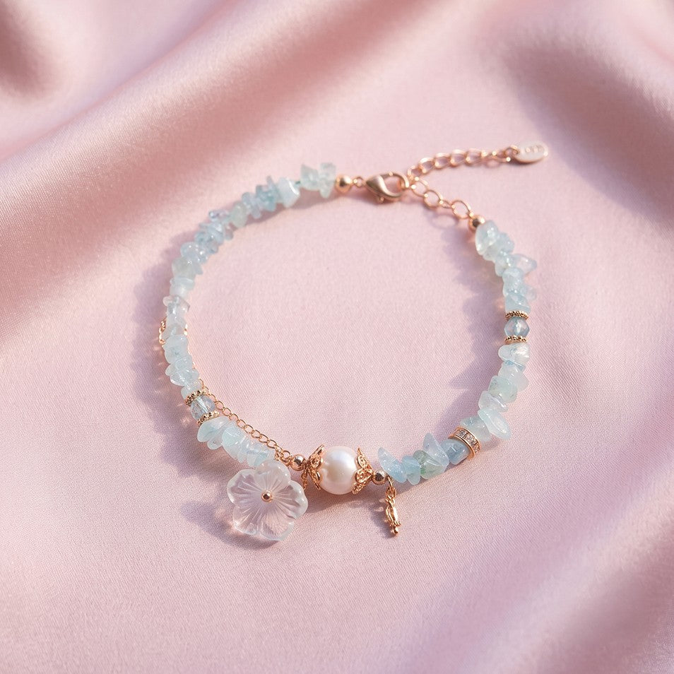 Aquamarine White Flower Charm Golden Chain Bracelet