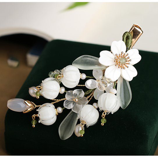 #bellflowerhairclips# #jewelryblossom##hairclips##weddinghairstyle##weddingjewelry# top view detail
#flowerjewelry#